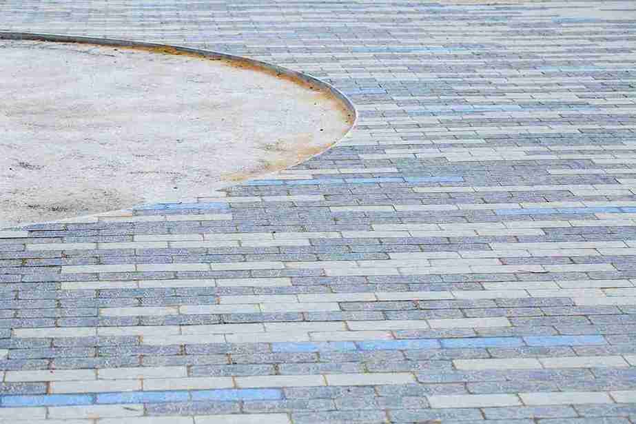Modern backyard patio built with durable concrete pavers for a home in North Royalton OH.